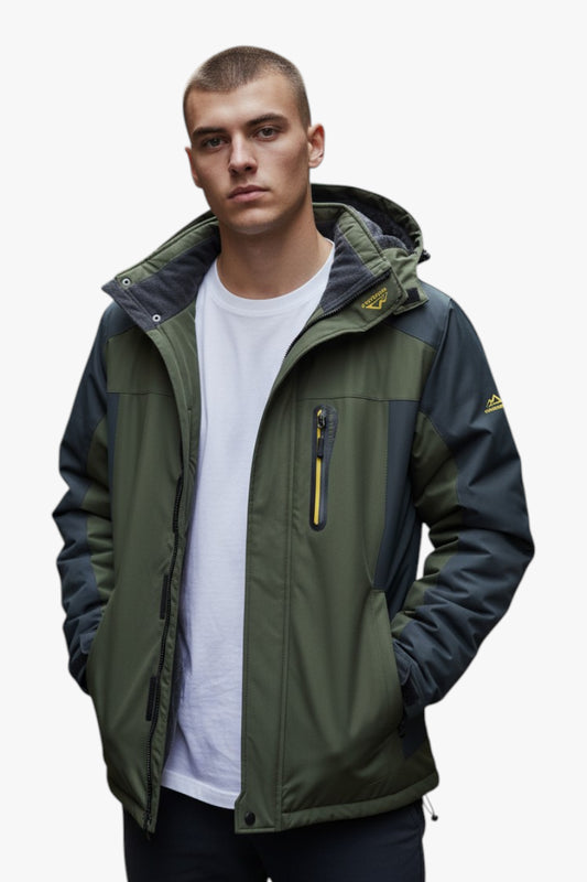 Man wearing a green and navy jacket on a white background