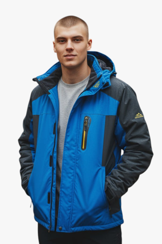 Man wearing a blue and gray jacket on a white background