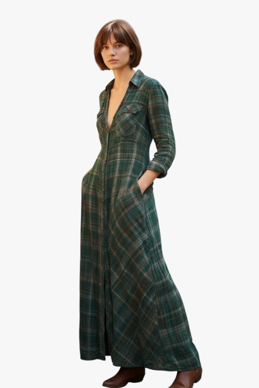 Woman wearing a long plaid coat on a white background