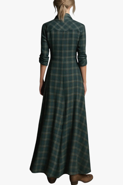 Long plaid dress worn by a person on a white background
